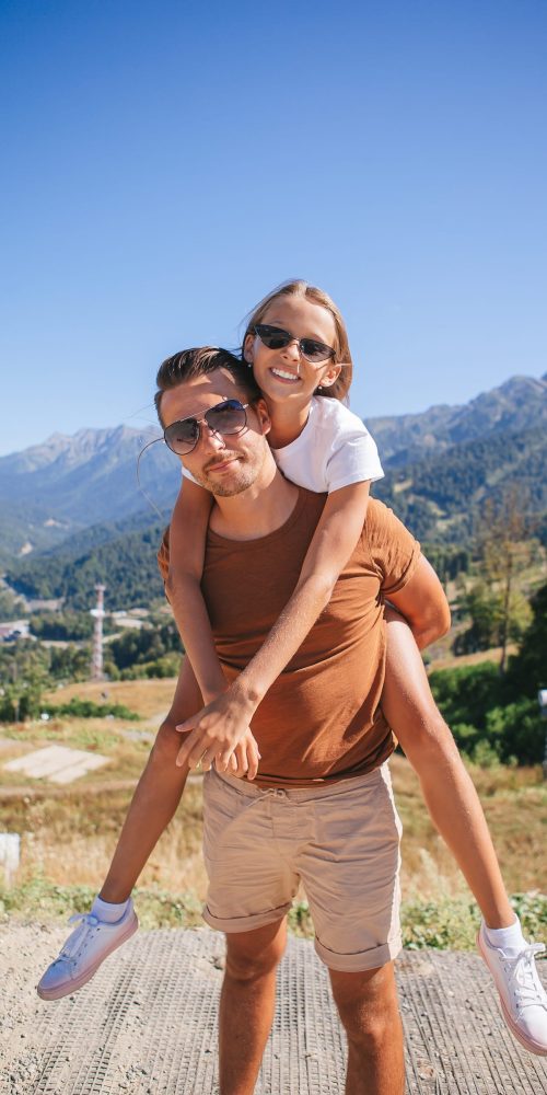 beautiful-happy-family-in-mountains-in-the-backgro-2025-02-12-00-30-48-utc